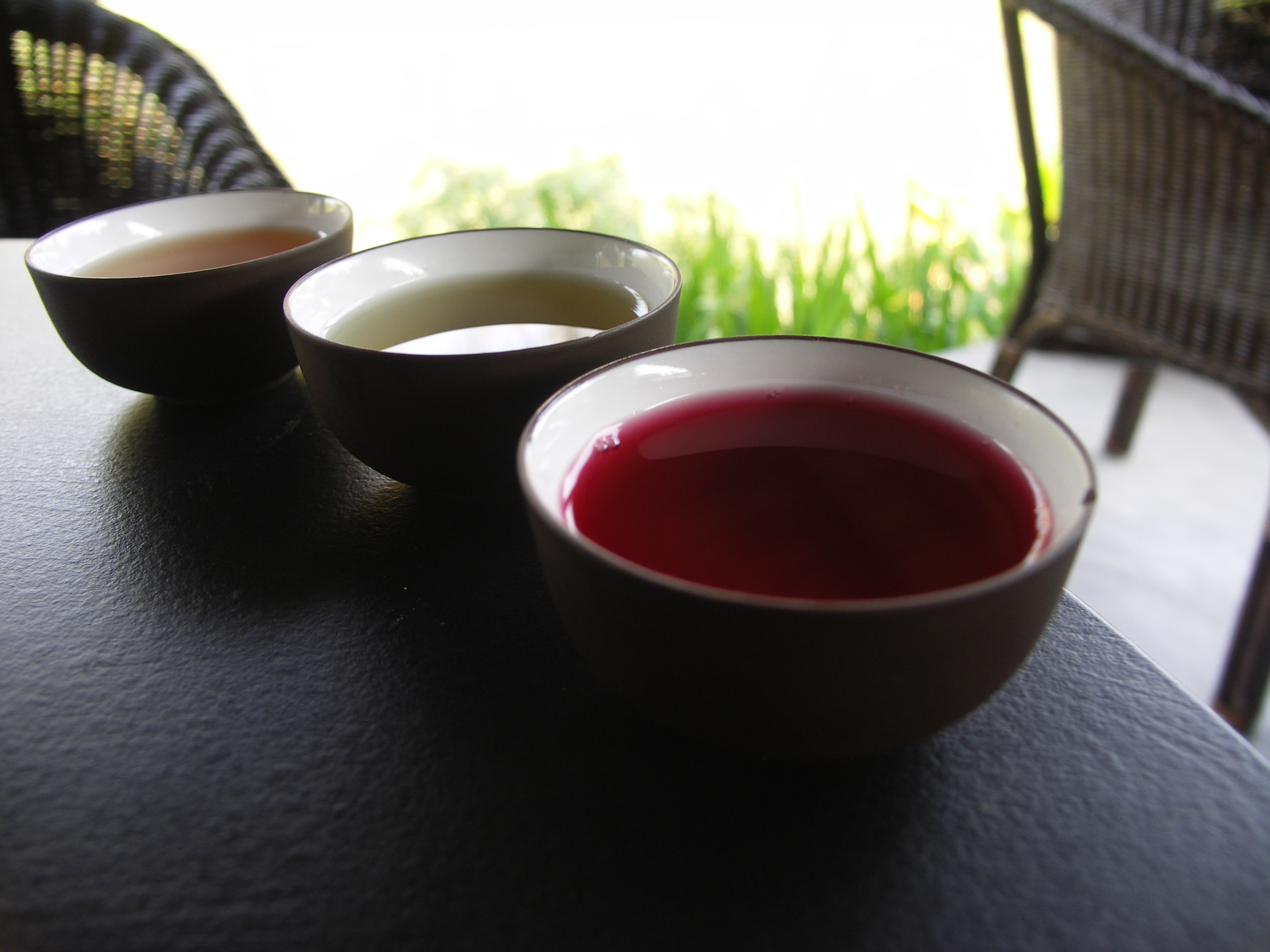 Tea tasting cups with rich liquor colors